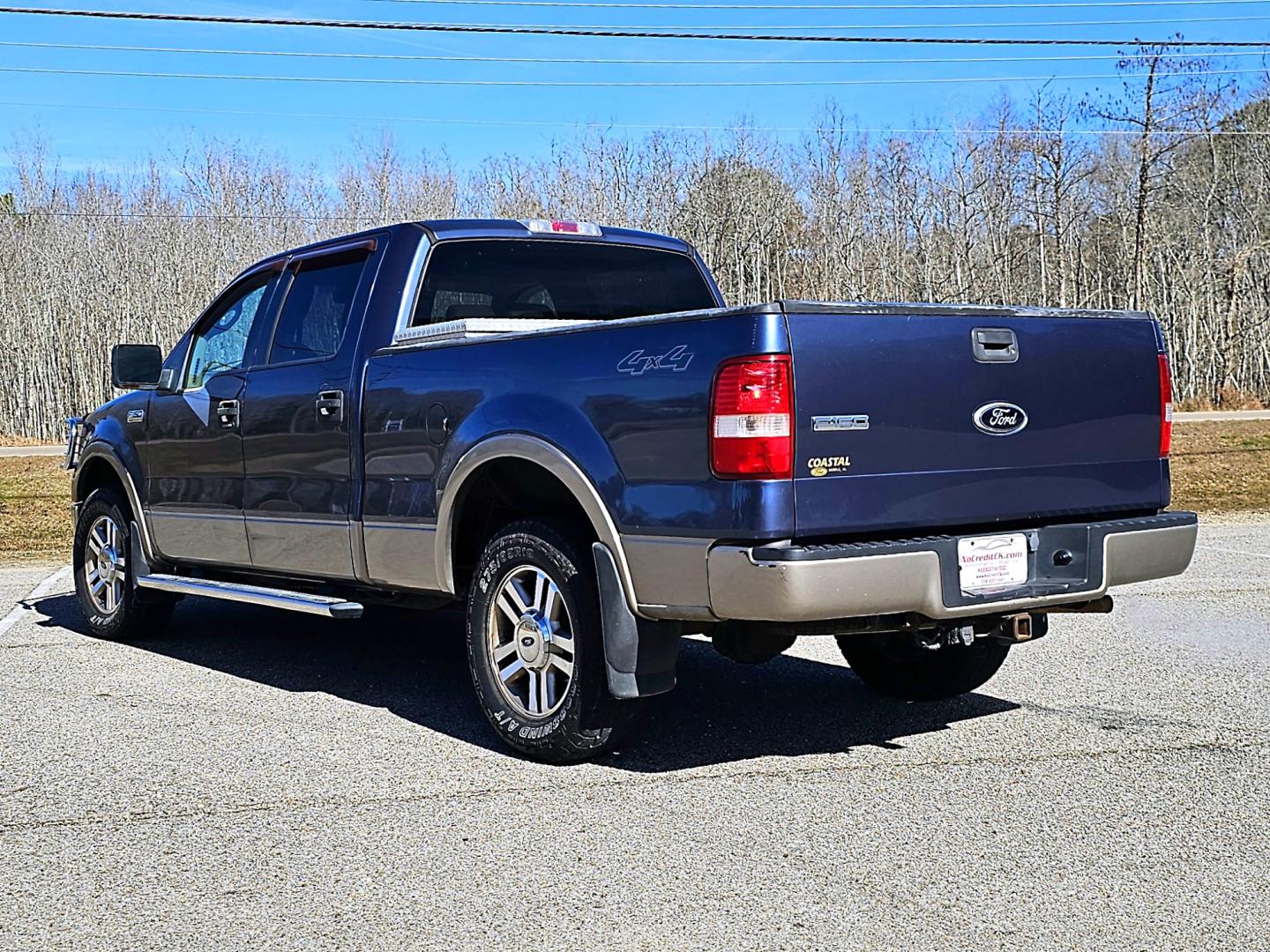 2006 Blue Ford F-150 Lariat SuperCrew (1FTPW14V86F) with an 5.4L V8 SOHC 24V FFV engine, 4-Speed Automatic Overdrive transmission, located at 18001 Kellogg Rd, Saucier, MS, 39574, (228) 832-1441, 39.421459, -76.641457 - Photo#5